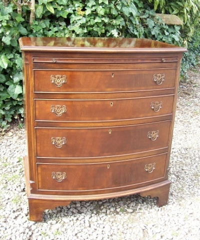 A Bow Front Chest of Drawers -SOLD-