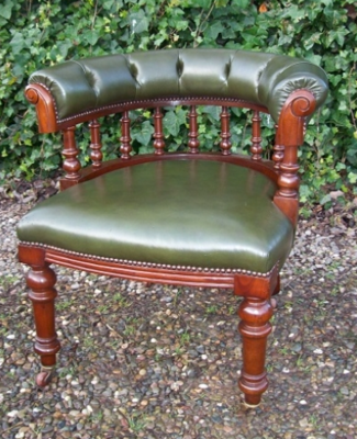 A Mahogany Green Leather Tub Chair -SOLD-