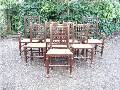 A Set of 8 Oak Spindle Back Chairs