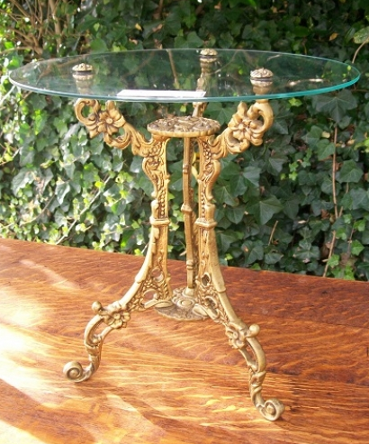 A Small Brass and Glass Table