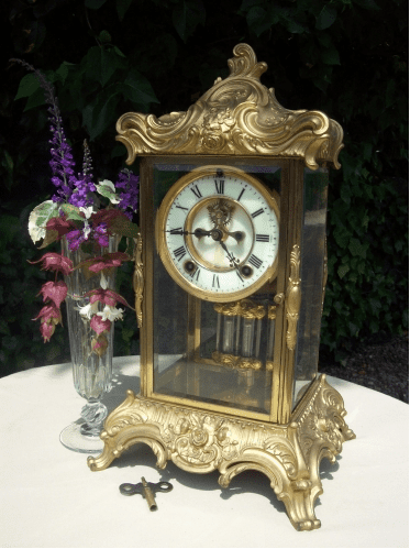 A French Ormolu Four Glass Clock