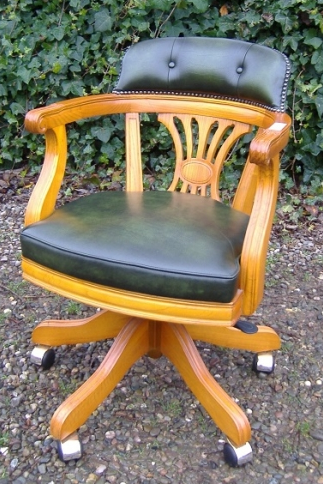 A Green Leather Executive Swivel Chair
