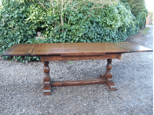 An Oak Extending Refectory Table -SOLD-