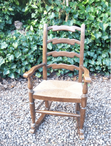 A Child's Oak Rocking Chair -SOLD-