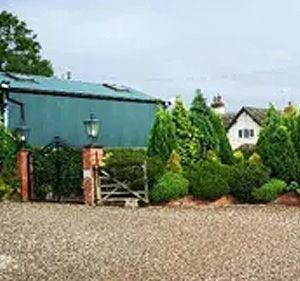 outside view of corner farm antiques