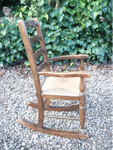 A Child's Oak Rocking Chair -SOLD-