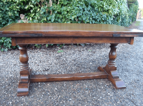 An Oak Extending Refectory Table -SOLD-