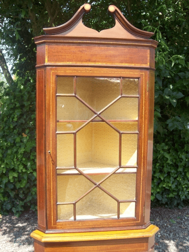 A Mahogany Corner Cabinet