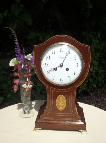 An 8 Day Balloon Mantle Clock - SOLD -