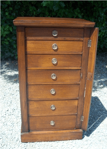 A Walnut Wellington Chest