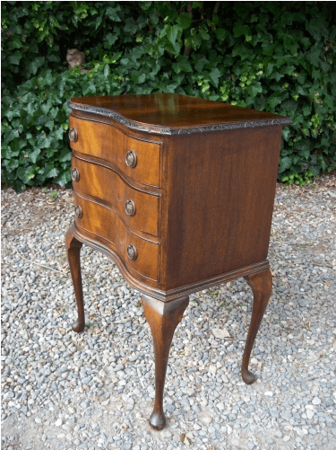 A Three Drawer Chest on Cabriole Legs