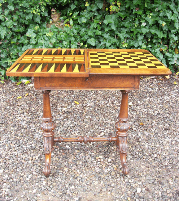  A Victorian Burr Walnut Games Sewing Table