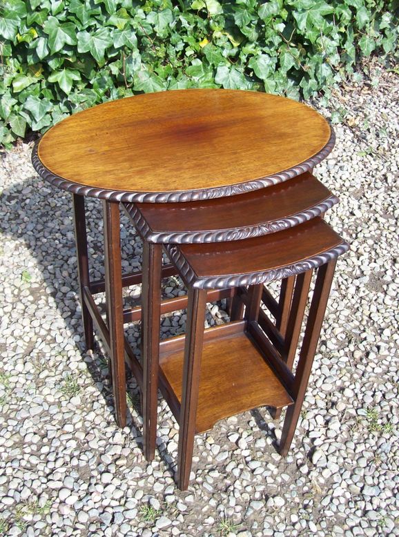 A Nest of Three Mahogany Tables