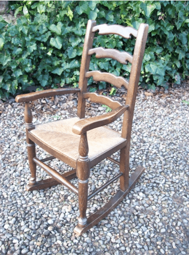 A Child's Oak Rocking Chair -SOLD-