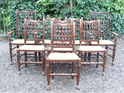 A Set of 8 Oak Spindle Back Chairs