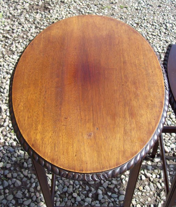 A Nest of Three Mahogany Tables