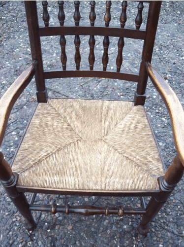 A Set of 8 Oak Spindle Back Chairs