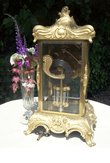 A French Ormolu Four Glass Clock