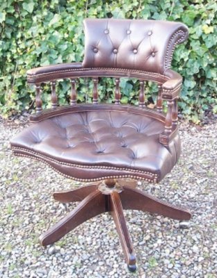 A Brown Leather Swivel Chair -SOLD-