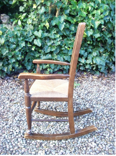 A Child's Oak Rocking Chair -SOLD-