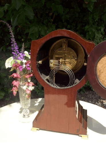 An 8 Day Balloon Mantle Clock - SOLD -