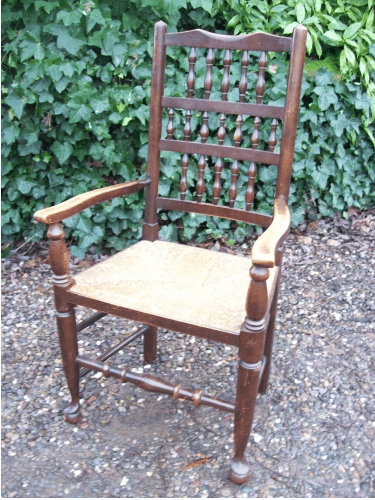 A Set of 8 Oak Spindle Back Chairs