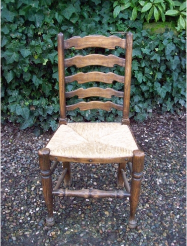 A Set of 8 Ladder Back Chairs -SOLD-