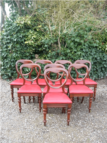 A Set of 8 Mahogany Balloon Back Chairs