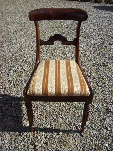 A Set of 8 Rosewood Chairs