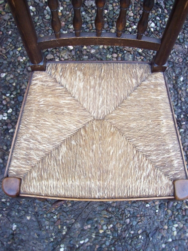 A Set of 8 Oak Spindle Back Chairs