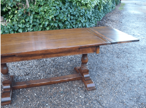 An Oak Extending Refectory Table -SOLD-