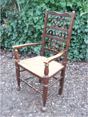 A Set of 8 Oak Spindle Back Chairs