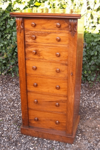 A Walnut Wellington Chest