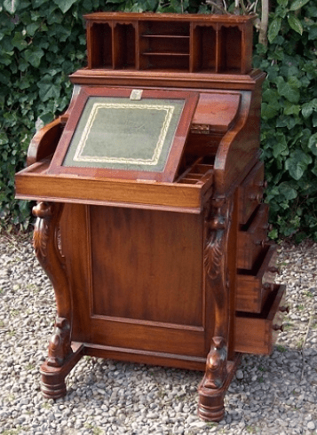 A Piano Top Walnut Davenport