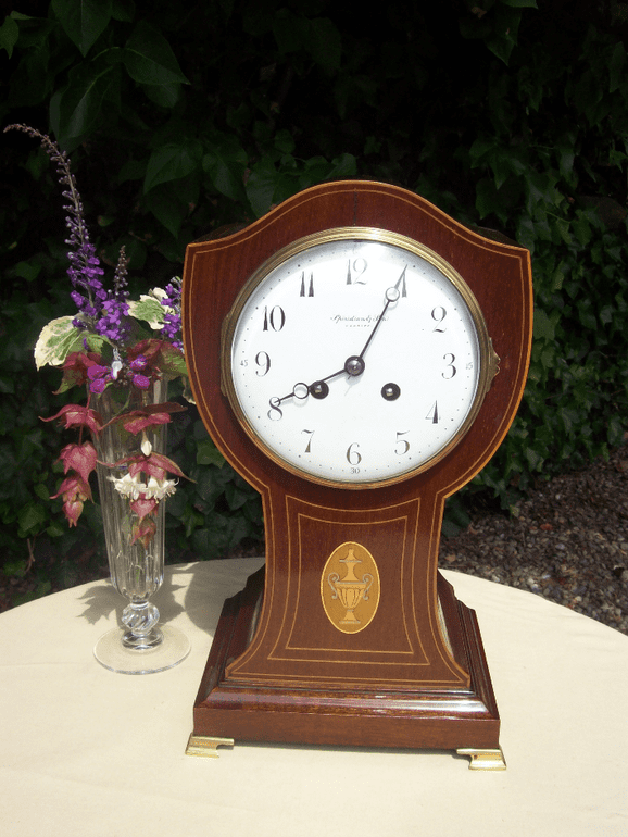 An 8 Day Balloon Mantle Clock - SOLD -