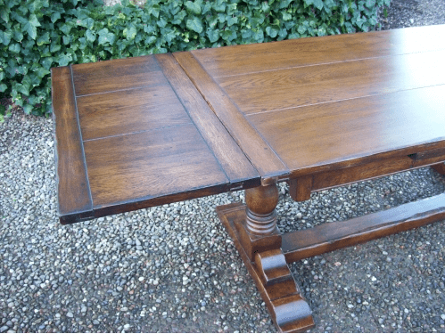 An Oak Extending Refectory Table -SOLD-