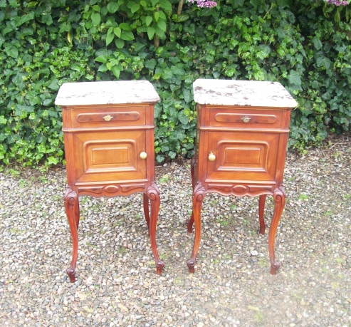 A Pair of Marble Top Pot Cupboards