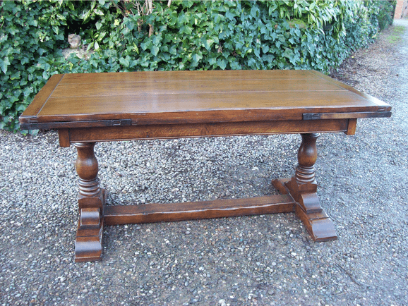 An Oak Extending Refectory Table -SOLD-