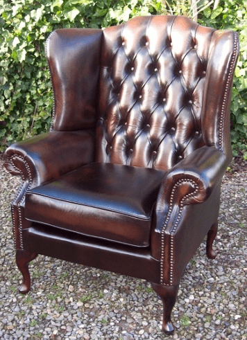 A Brown Leather Wing Chair -SOLD-