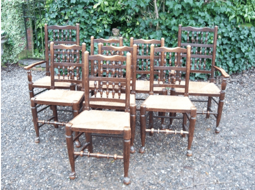 A Set of 8 Oak Spindle Back Chairs
