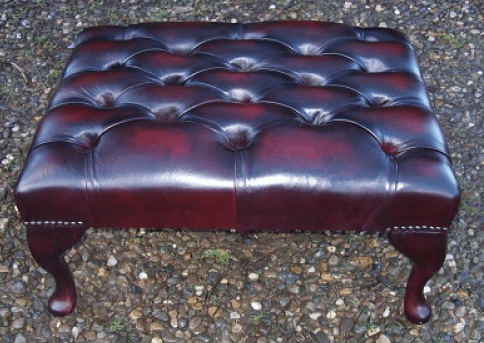 A Burgundy Leather Foot Stool -SOLD-