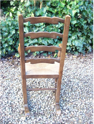 A Child's Oak Rocking Chair -SOLD-