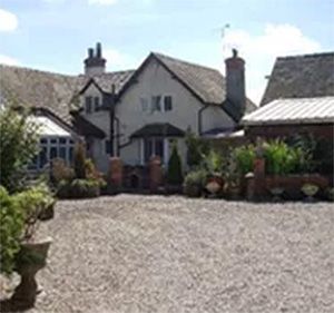 outside view of corner farm antiques