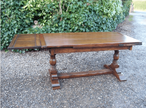 An Oak Extending Refectory Table -SOLD-