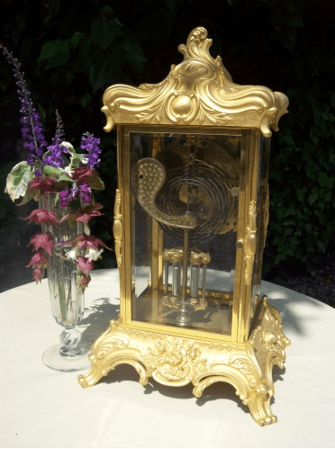 A French Ormolu Four Glass Clock