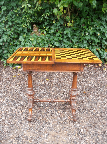  A Victorian Burr Walnut Games Sewing Table