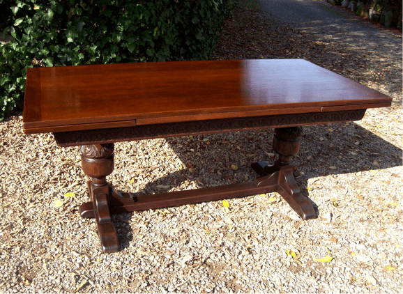 A Ten Seat Oak Extending Refectory Table